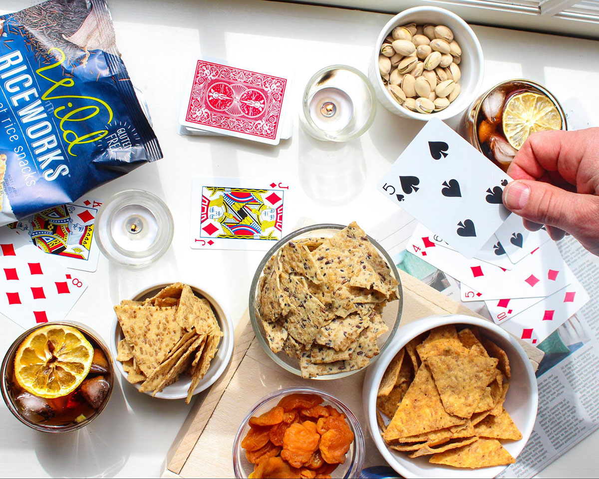 Playing cards withRiceworks and other snacks